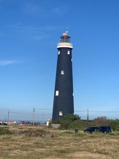 Rounding the point at Dungeness - this is the old lighthouse